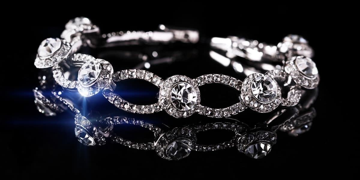 Close-up of gold jewellery on a warm surface